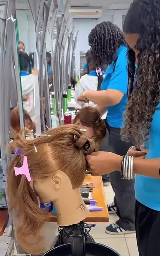 Students developing beauty and personal-care skills.