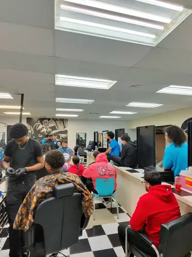 Hands-on practice in the Barbering and Styling workshop.