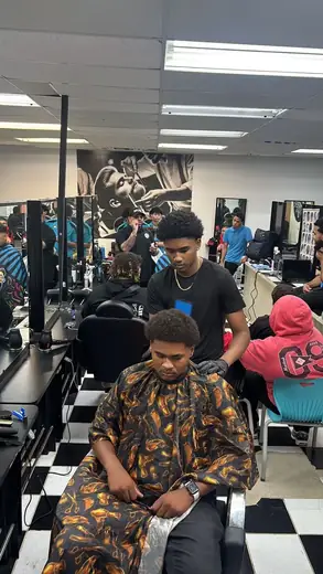 Student applying haircutting and customer-service techniques.