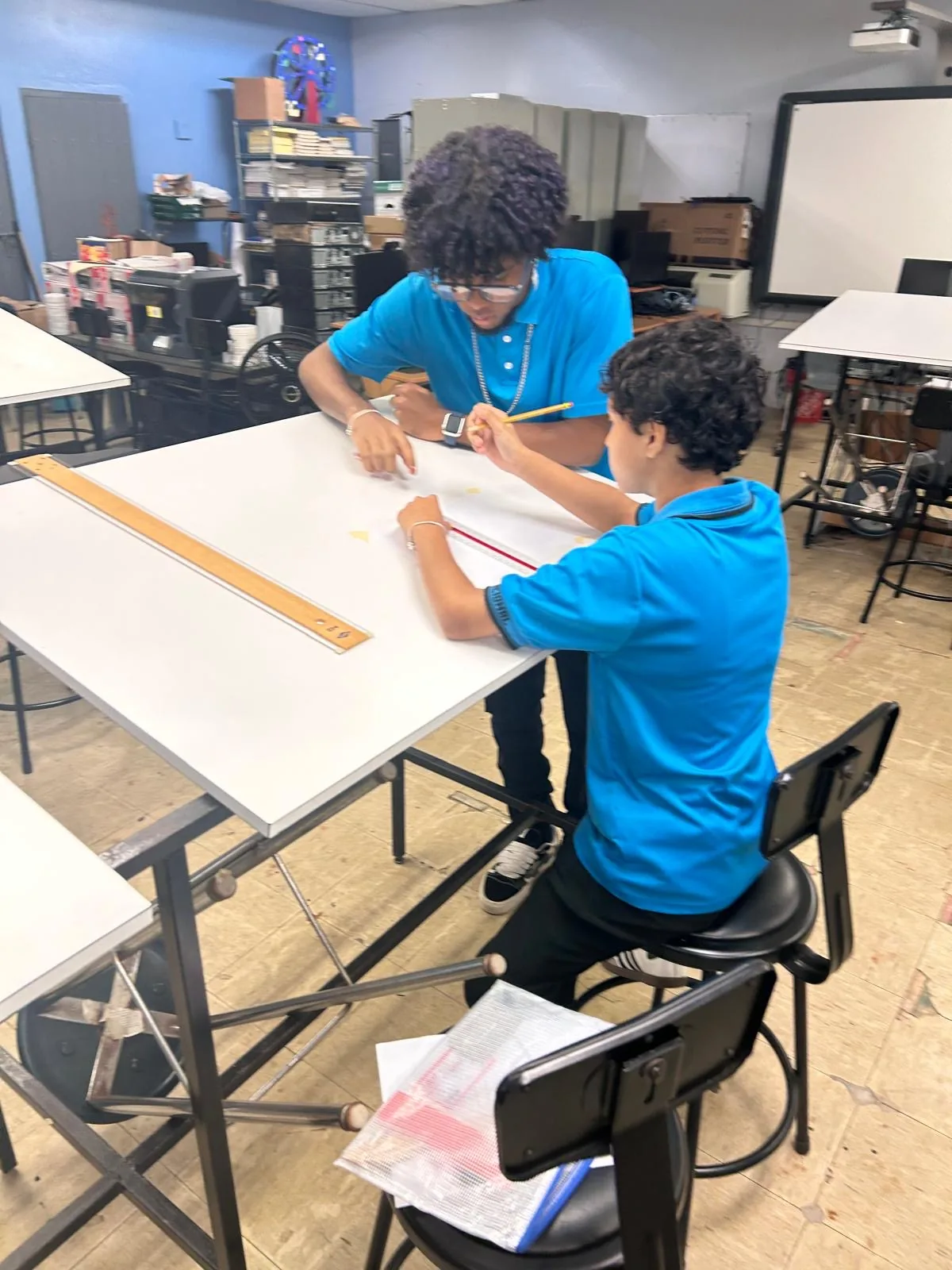 Students completing a technical drawing activity
